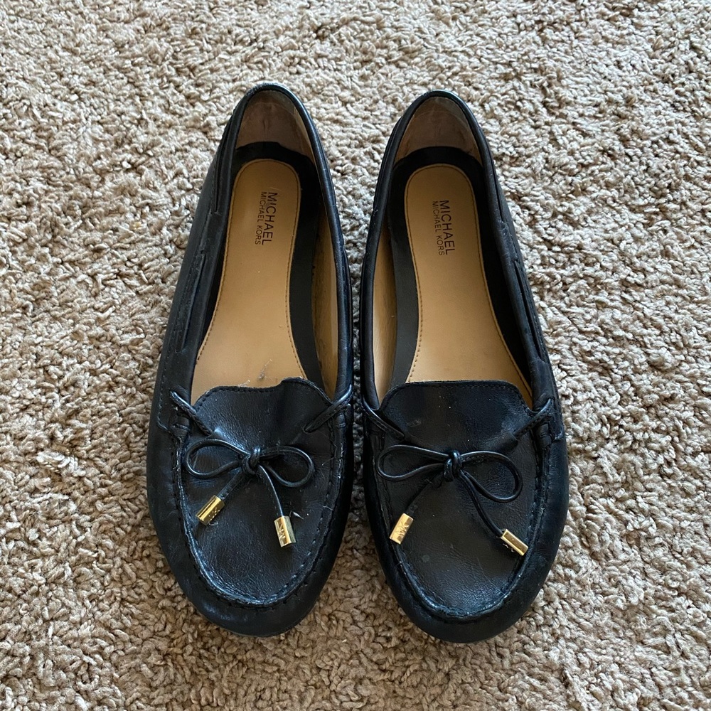 Michael Kors black and gold leather loafers